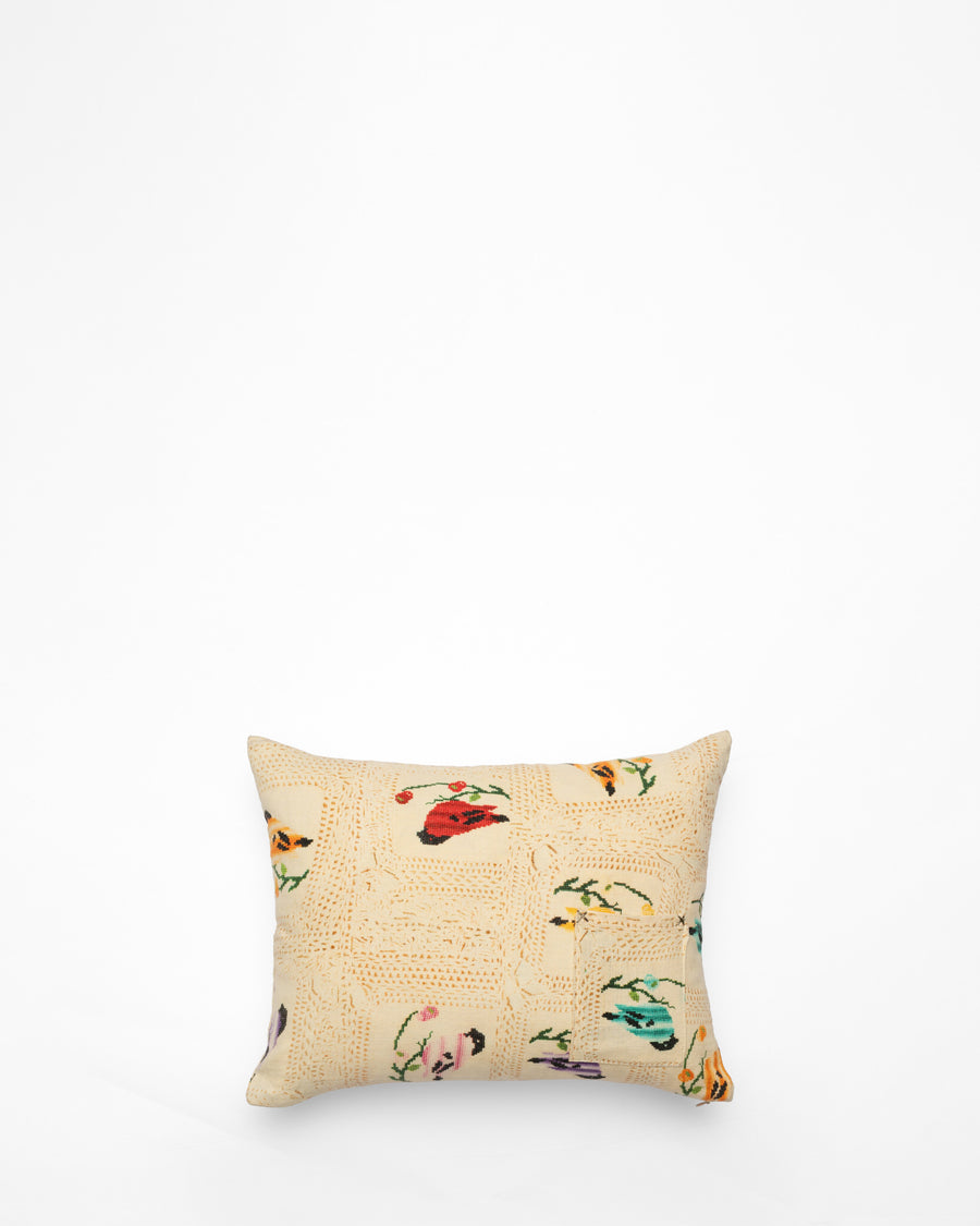 Bread embroidered cushion, back view