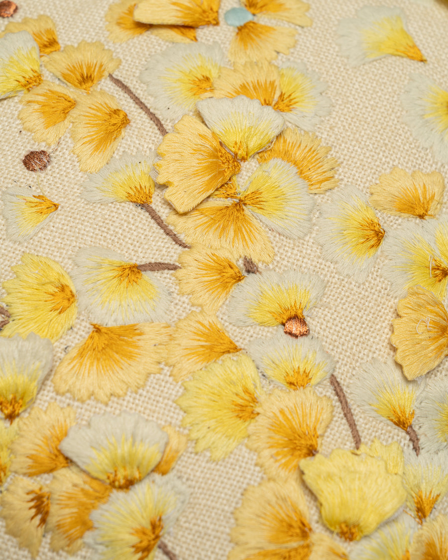 Crescendo embroidery detail close-up