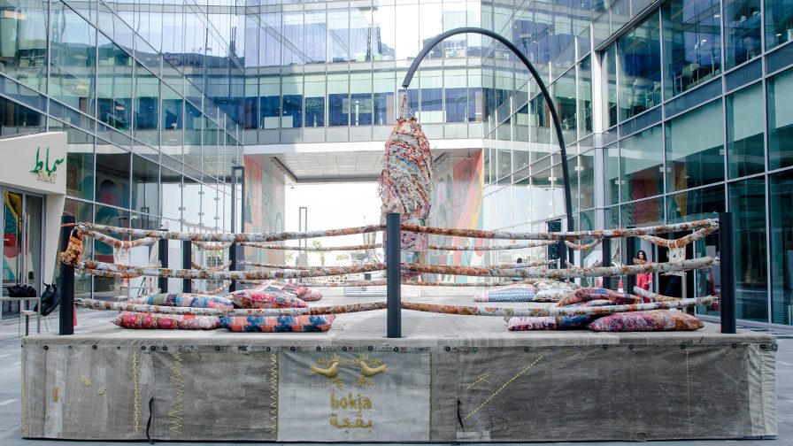 The interactive installation 'Let's Talk About the Weather' resembles a boxing ring and is made using recycled materials. Photo: Bokja